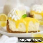 a slice of gluten-free lemon cheesecake with homemade lemon curd