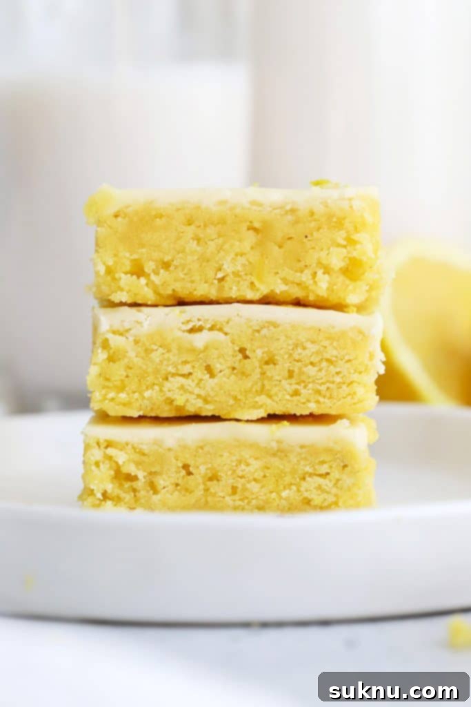 Simple Scratch-Made Lemon Curd 11 Front view of gluten-free lemon brownies stacked